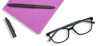 Black pen, purple notebook, and eyeglasses.